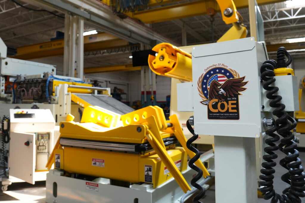 **COE SpaceMaster Compact Cut-to-Length Line with motorized paddle-loop reel and feeder/straightener**